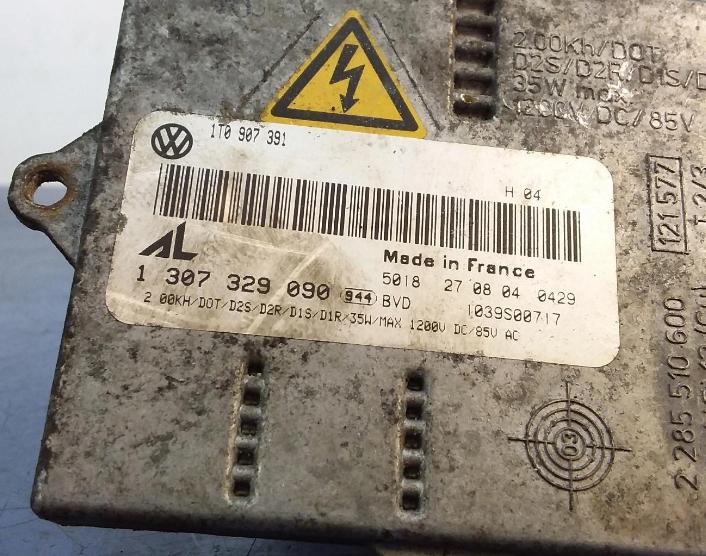 VW GOLF V Menič XENON 1T0907391 1307329090