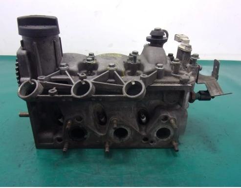 VOLKSWAGEN POLO 1.2 V6 Hlava valcov  03D103374F  ( poskodeny ventil - vackovy hriadel pridrety ) 