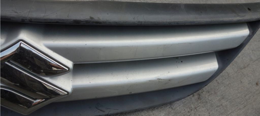 Suzuki Liana Mriežka maska 72111-54GB0