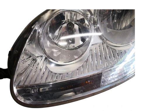 Volkswagen Golf V 2003-2009 hatchback 1.6 SR petrol MT 75 kW 2005  Svetlo predné ľavé 1K6941005N 0301212203