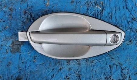 Hyundai Coupe II (Tiburon) GK 2001-2012 coupe 2.0 16v petrol MT 105 kW 2003  Kľučka dverí vonkajšia predná ľavá