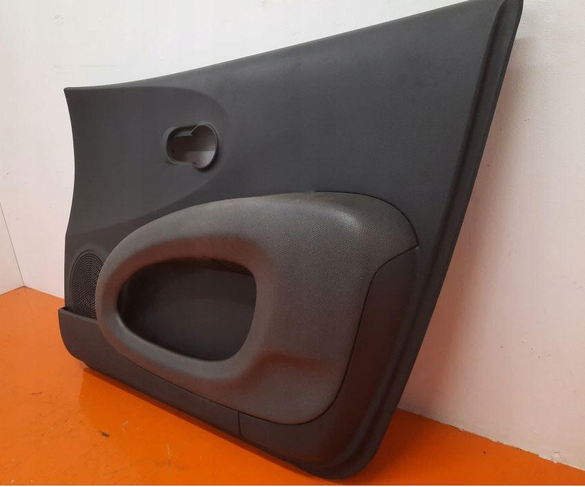 Nissan Micra K12 2003-2010 hatchback 1.2 16v petrol MT 48 kW 2006 Tapacír dverí predný pravý 5-dverovy