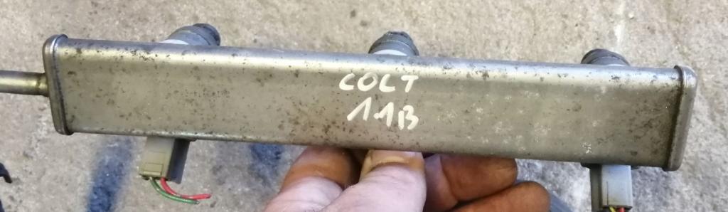 Mitsubishi Colt Z30 VI 2004-2012 hatchback 1.1 12v petrol MT 55 kW 2009  Vstrekovacia lišta MR988977