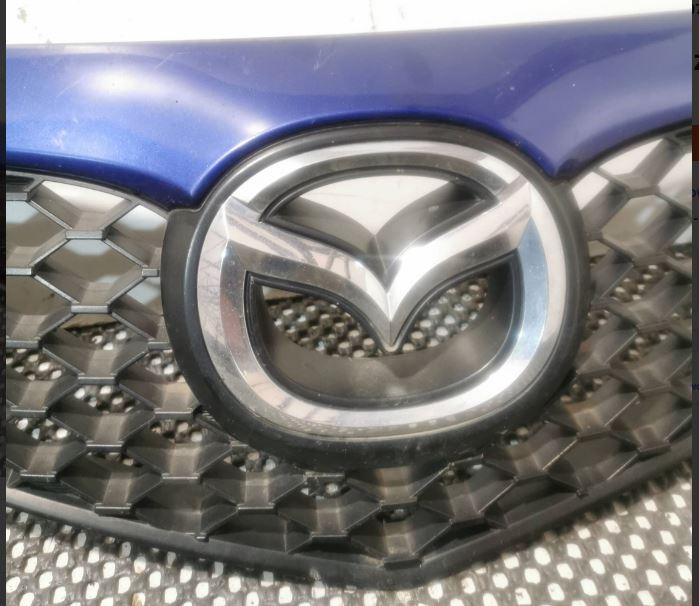 Mazda 3 I BK 2003-2009 hatchback 1.6 CITD diesel MT 80 kW 2004  Mriežka predná (maska chladiča) BR5S50711