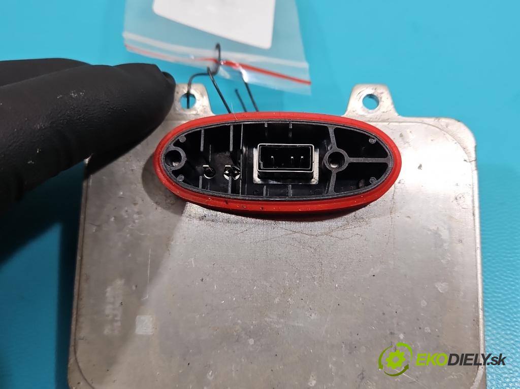 Chrysler Voyager V 2007-2016 3.8 V6 215KM automatic 158 kW 3778 cm3 5- střídač: xenon 5DV009000-00 (Riadiaca jednotka xenónu)