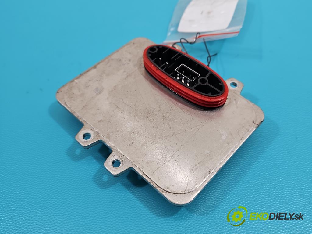 Chrysler Voyager V 2007-2016 3.8 V6 215KM automatic 158 kW 3778 cm3 5- střídač: xenon 5DV009000-00 (Riadiaca jednotka xenónu)