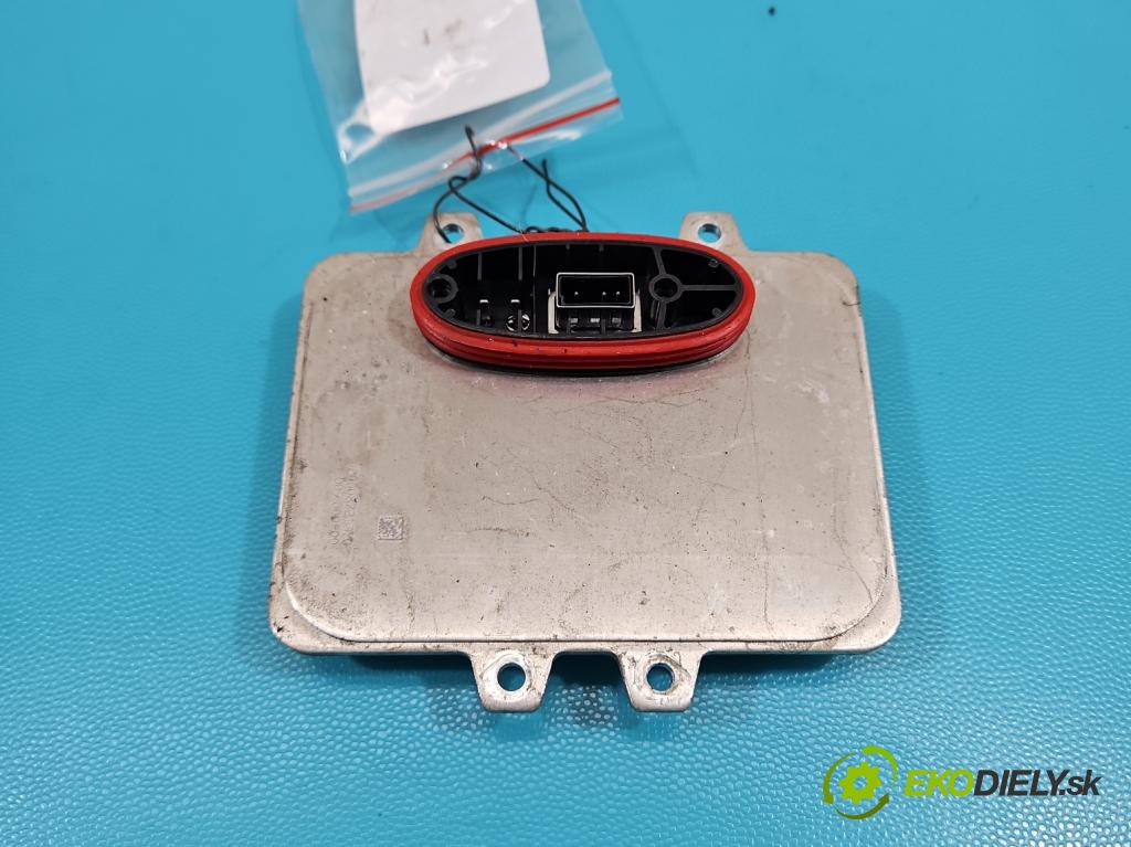 Chrysler Voyager V 2007-2016 3.8 V6 215KM automatic 158 kW 3778 cm3 5- střídač: xenon 5DV009000-00 (Riadiaca jednotka xenónu)