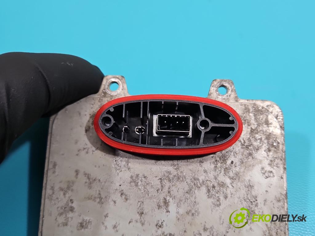 Chrysler Voyager V 2007-2016 3.8 V6 215KM automatic 158 kW 3778 cm3 5- střídač: xenon 5DV009000-00 (Riadiaca jednotka xenónu)