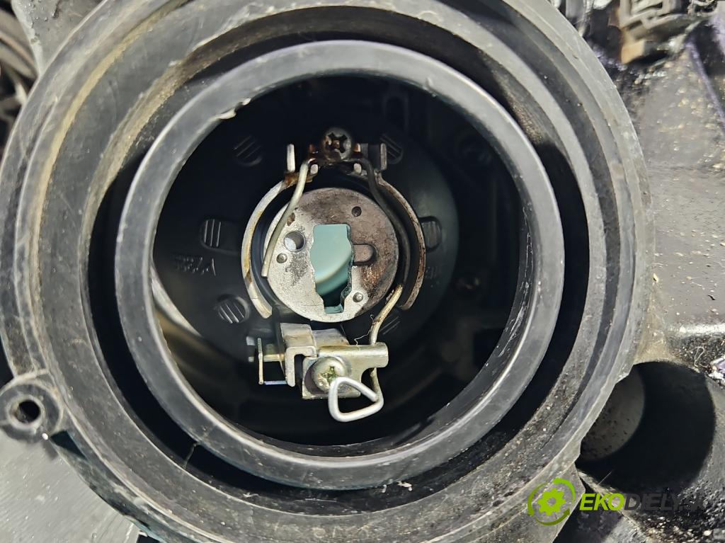 Honda Civic VII 2000-2006 1.4 16V 90 hp manual 66 kW 1396 cm3 5- světlo levý  (Klika dveří ostatní)