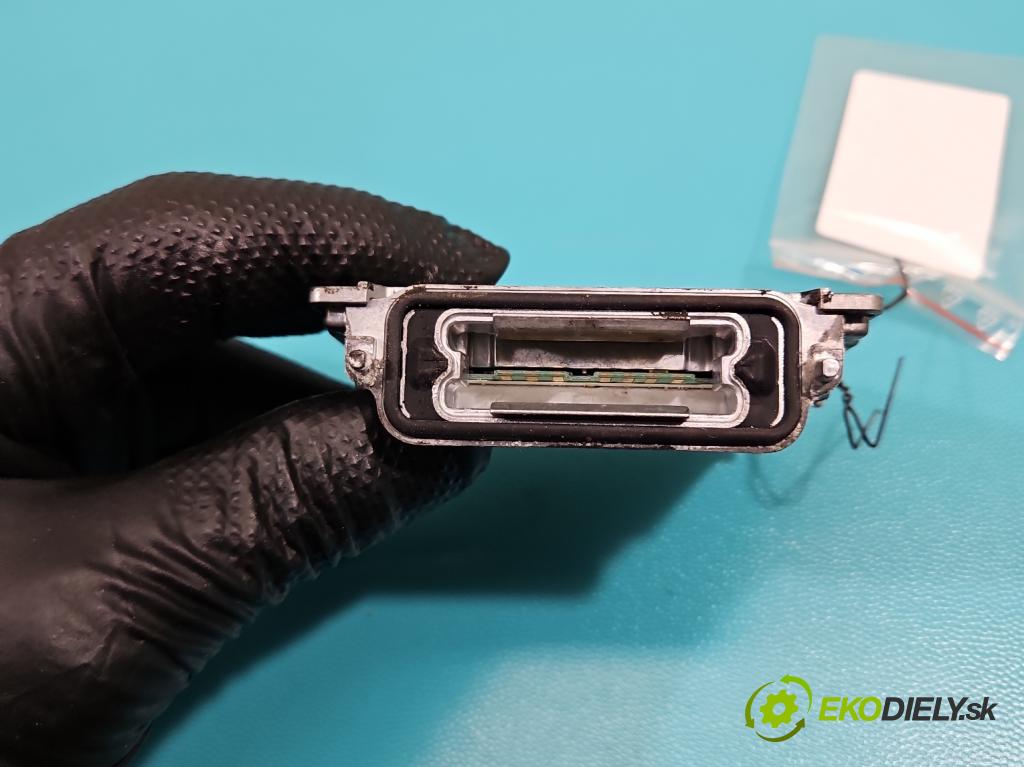 Opel Signum 2.2 16V 155 HP manual 114 kW 2198 cm3 5- střídač: xenon 89034934 (Riadiaca jednotka xenónu)