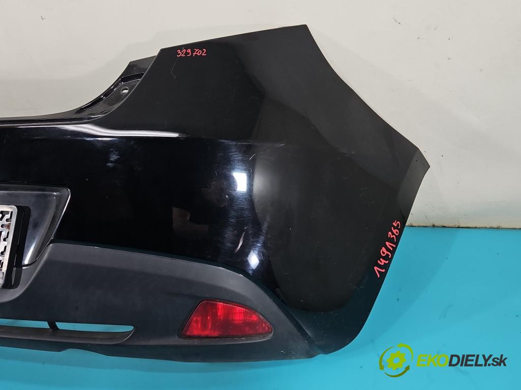 Mazda 2 II 2007-2014 1.3 16V 75 hp manual 55 kW 1349 cm3 5- nárazník zadní  (Klika dveří ostatní)