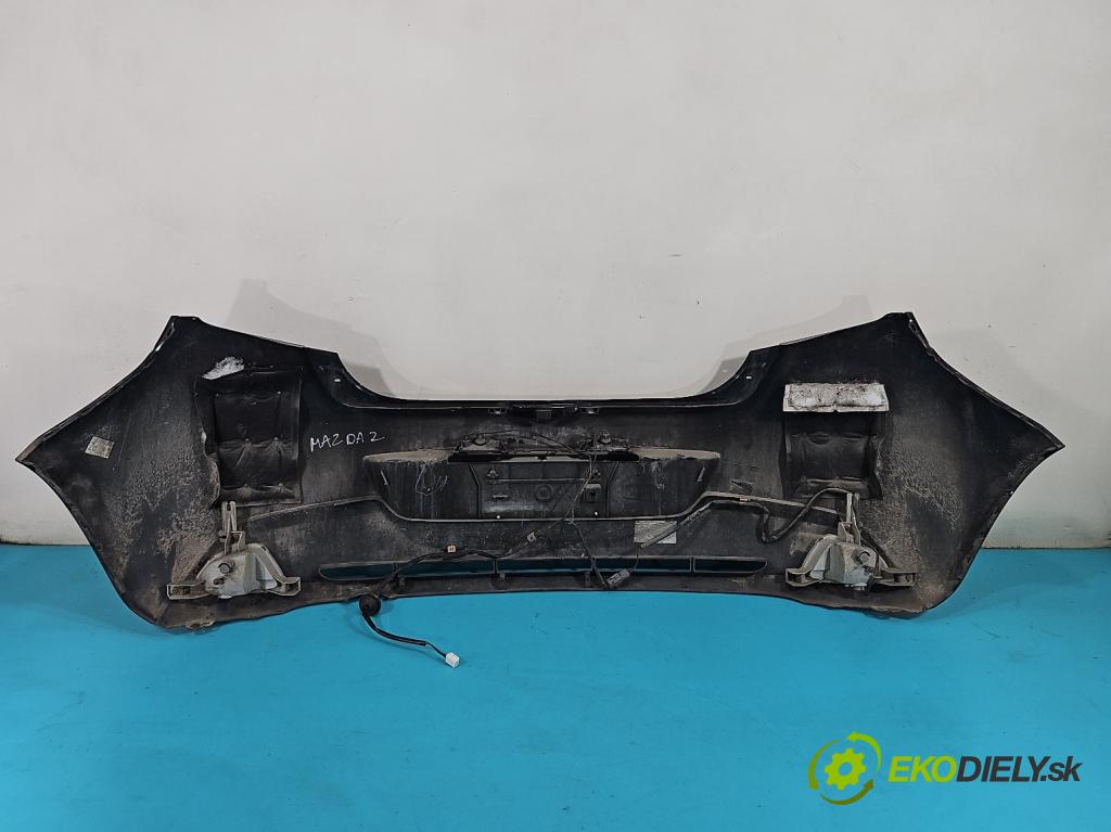 Mazda 2 II 2007-2014 1.3 16V 75 hp manual 55 kW 1349 cm3 5- nárazník zadní  (Klika dveří ostatní)