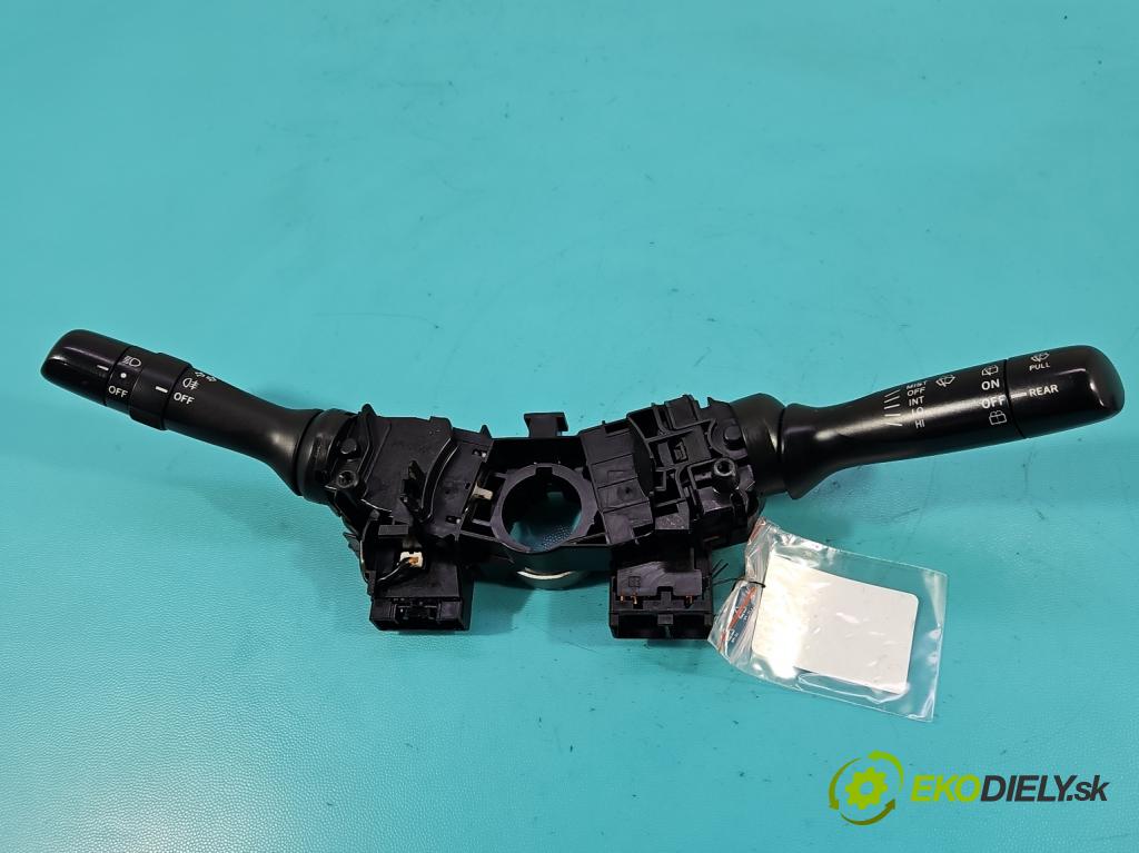 Toyota Yaris II 2005-2011 1.4 D4D 90 HP automatic 66 kW 1364 cm3 5- prepínač komplex: 0D09017F143 (Prepínacie páčky pod volantom)
