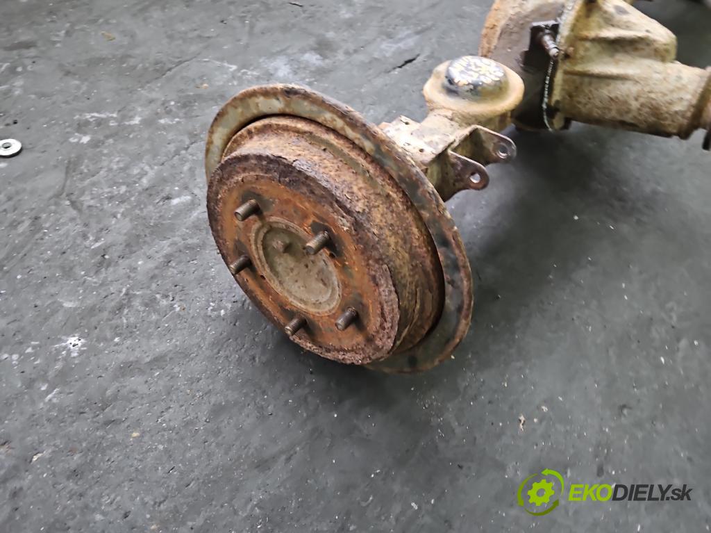 Suzuki JIMNY III 1998-2018 1.3 16V VVT 80 HP manual 59 kW 1298 cm3 3- Most: zadní: