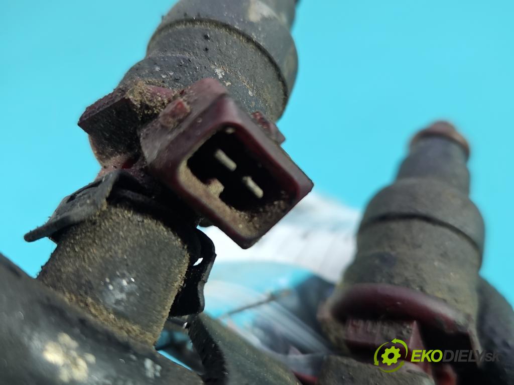 Jeep Cherokee XJ 1984-2001 122 HP manual 90 kW 2465 cm3 5- vstrek 53007232 (Vstrekovač paliva)