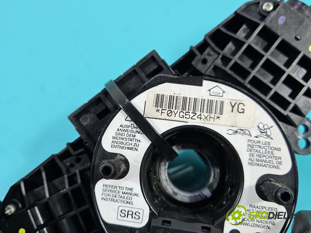 Honda City IV 2002-2008 1.4 8v 83 HP manual 61 kW 1339 cm3 4- prepínač komplex:  (Prepínacie páčky pod volantom)