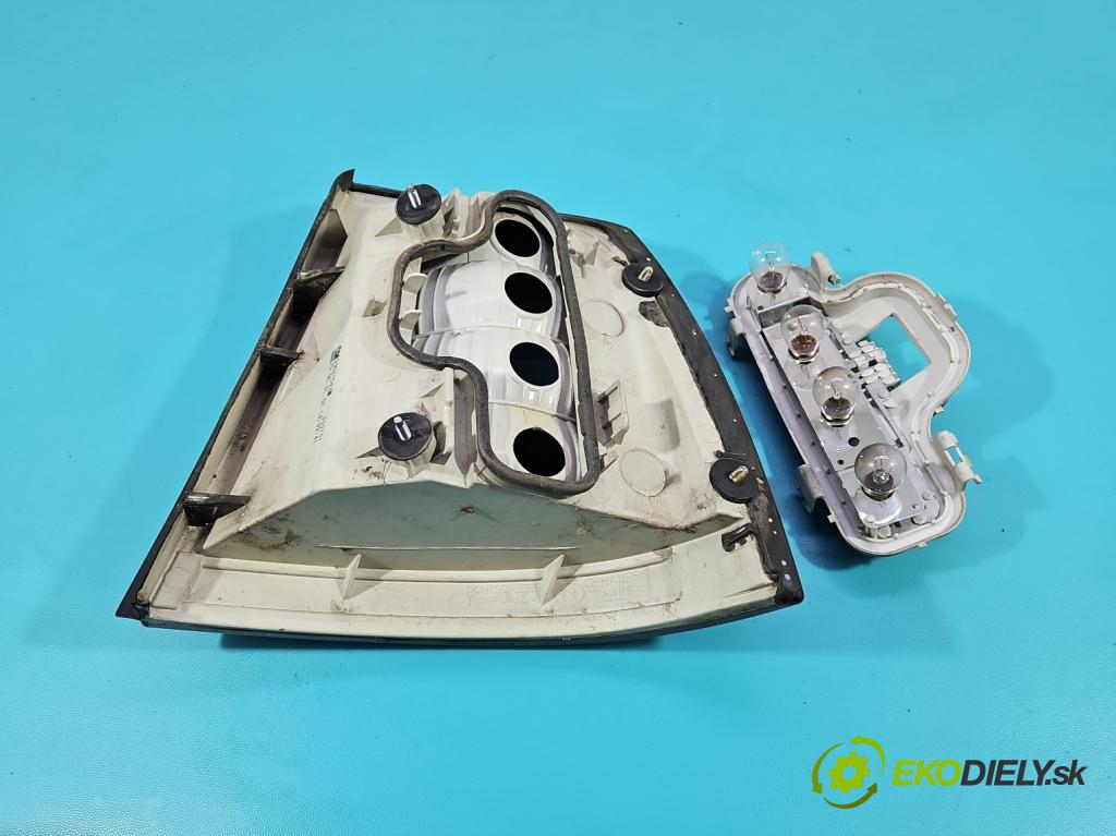 Opel Astra II 1998-2009 1.6 8V 84KM manual 62 kW 1598 cm3 5- svetlo / reflektor zadné ľavé 90521542 (Kľučka dverí ostatné)