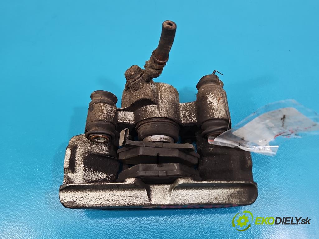 Toyota Yaris I 1999-2005 1.0 vvti 68 HP manual 50 kW 998 cm3 5- brzdič zadné pravý  (Kľučka dverí ostatné)