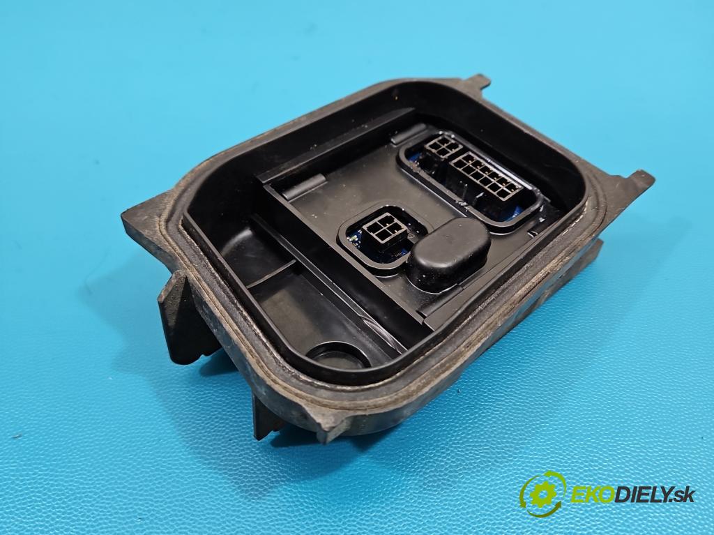 Vw Passat B6 2005-2010 2.0 tdi 140 hp manual 103 kW 1968 cm3 5- měnič xenon 7L6941329A (Řídící jednotka xenonu)