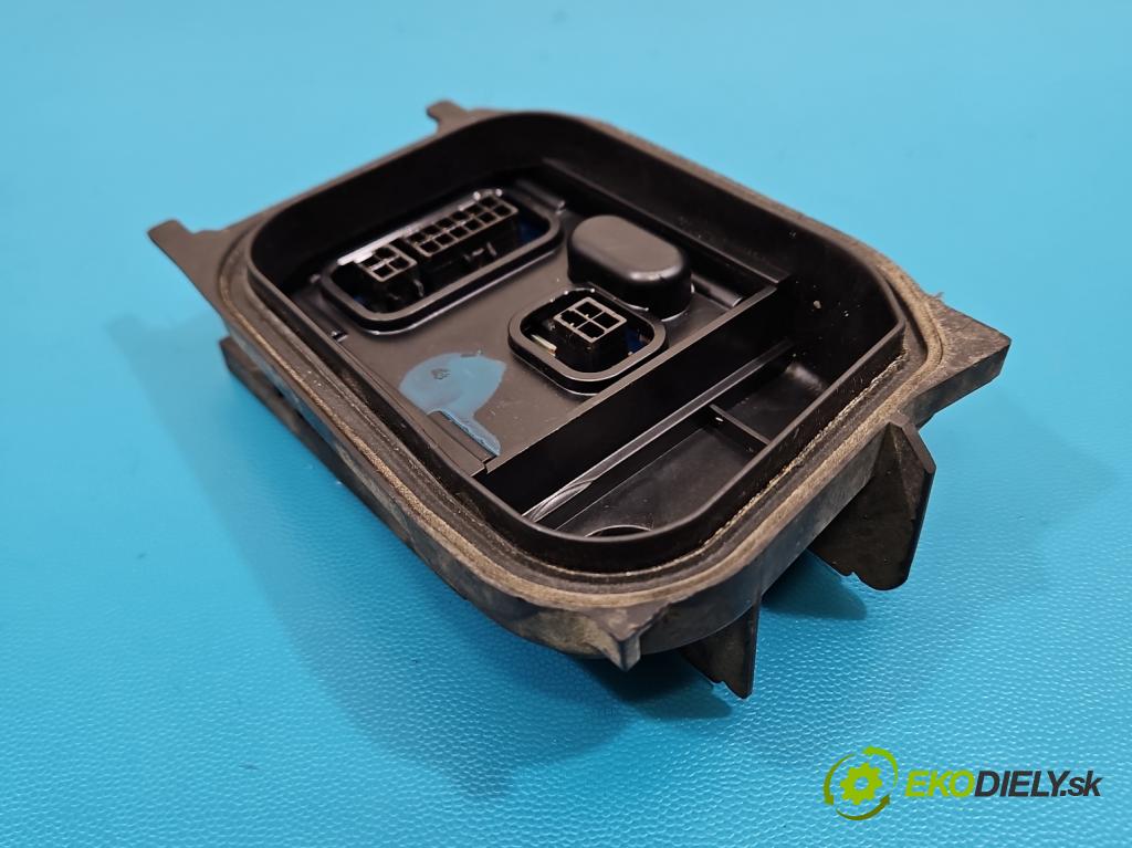 Vw Passat B6 2005-2010 2.0 tdi 140 hp manual 103 kW 1968 cm3 5- měnič xenon 7L6941329A (Řídící jednotka xenonu)