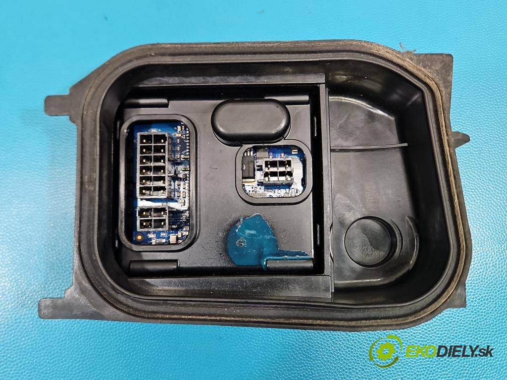 Vw Passat B6 2005-2010 2.0 tdi 140 hp manual 103 kW 1968 cm3 5- měnič xenon 7L6941329A (Řídící jednotka xenonu)