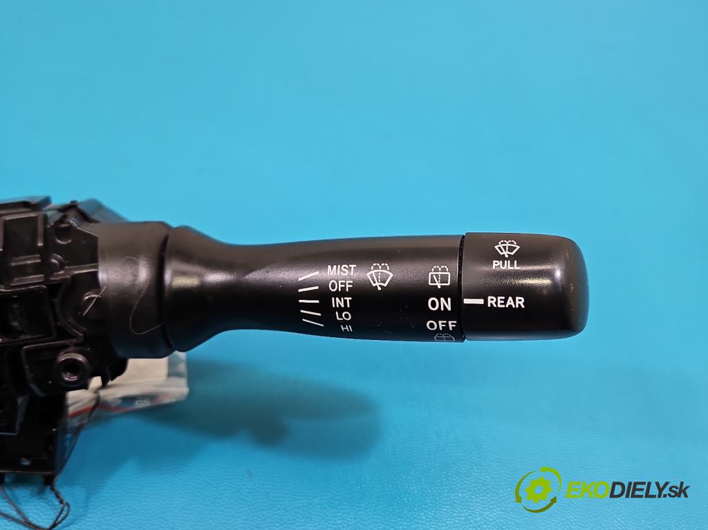 Toyota Yaris II 2005-2011 1.0 vvti 69KM manual 51 kW 998 cm3 5- prepínač komplex: 17F143 (Prepínacie páčky pod volantom)