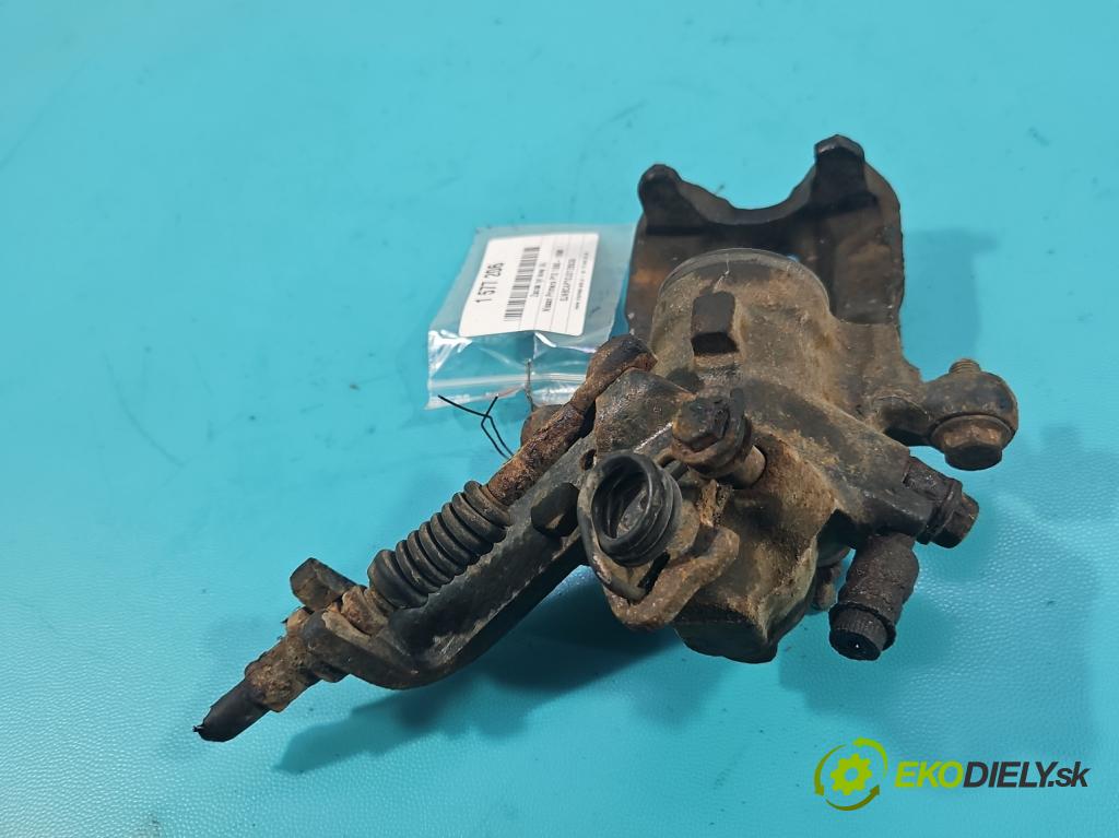 Nissan Primera P10 1990-1998 2.0 16V 121KM manual 89 kW 1998 cm3 4- brzdič zadní levý  (Klika dveří ostatní)