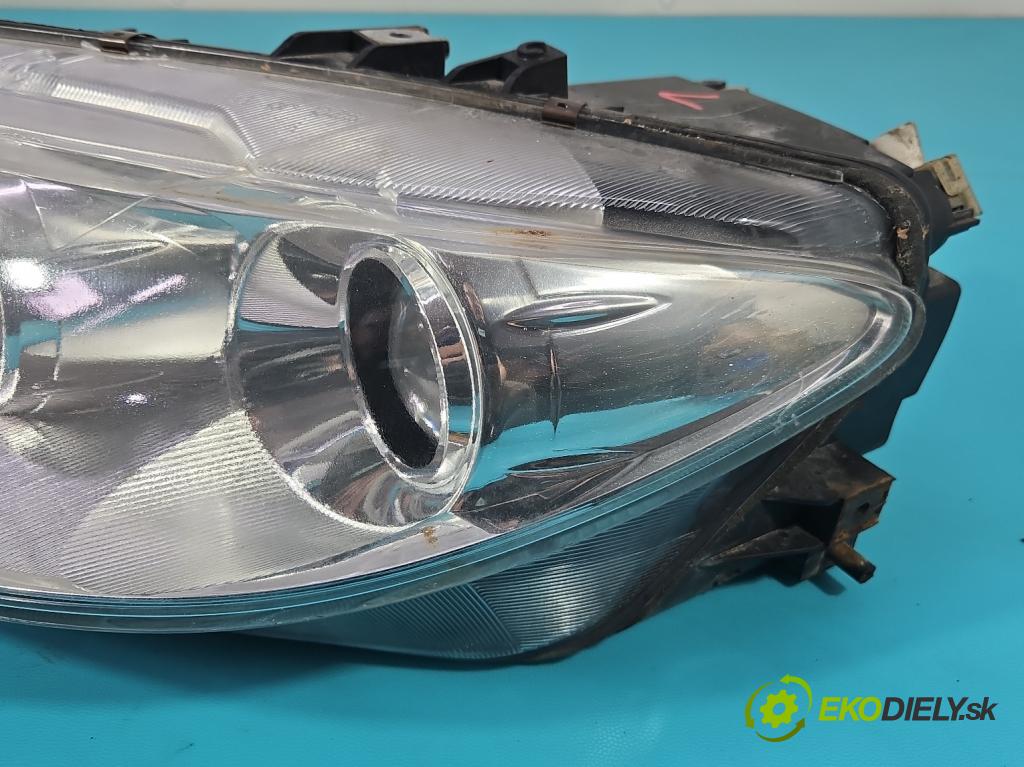 Mazda 6 I GG 2002-2007 2.0 16V 141 HP manual 104 kW 1999 cm3 5- Reflektor: ľavý 014003902 (Kľučka dverí ostatné)