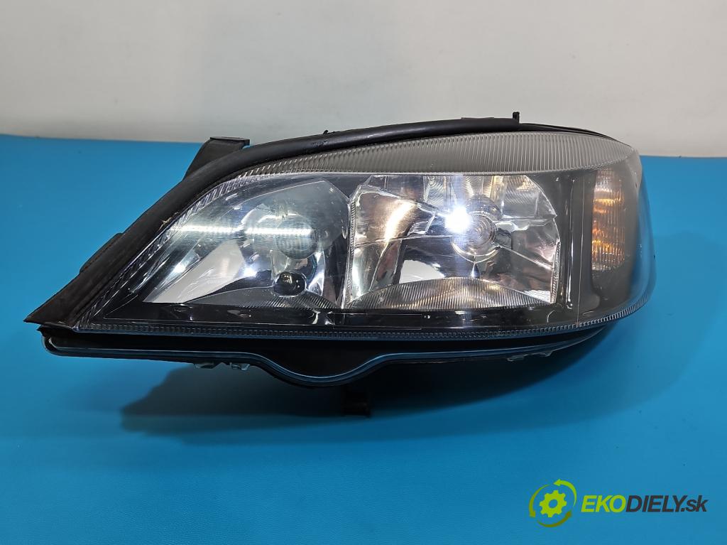 Opel Astra II 1998-2009 1.6 8V 84KM manual 62 kW 1598 cm3 3- světlo levý  (Klika dveří ostatní)
