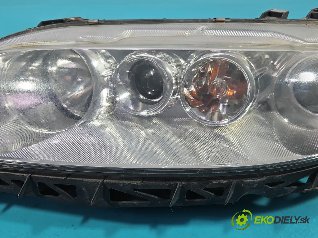 Mazda 6 I GG 2002-2007 1.8 16V 120 HP manual 88 kW 1798 cm3 4- Reflektor: ľavý 014002472L (Kľučka dverí ostatné)