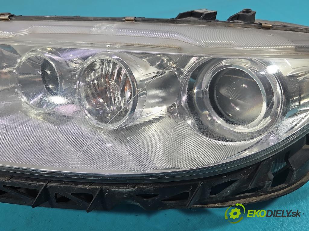 Mazda 6 I GG 2002-2007 1.8 16V 120 HP manual 88 kW 1798 cm3 4- Reflektor: ľavý 014002472L (Kľučka dverí ostatné)