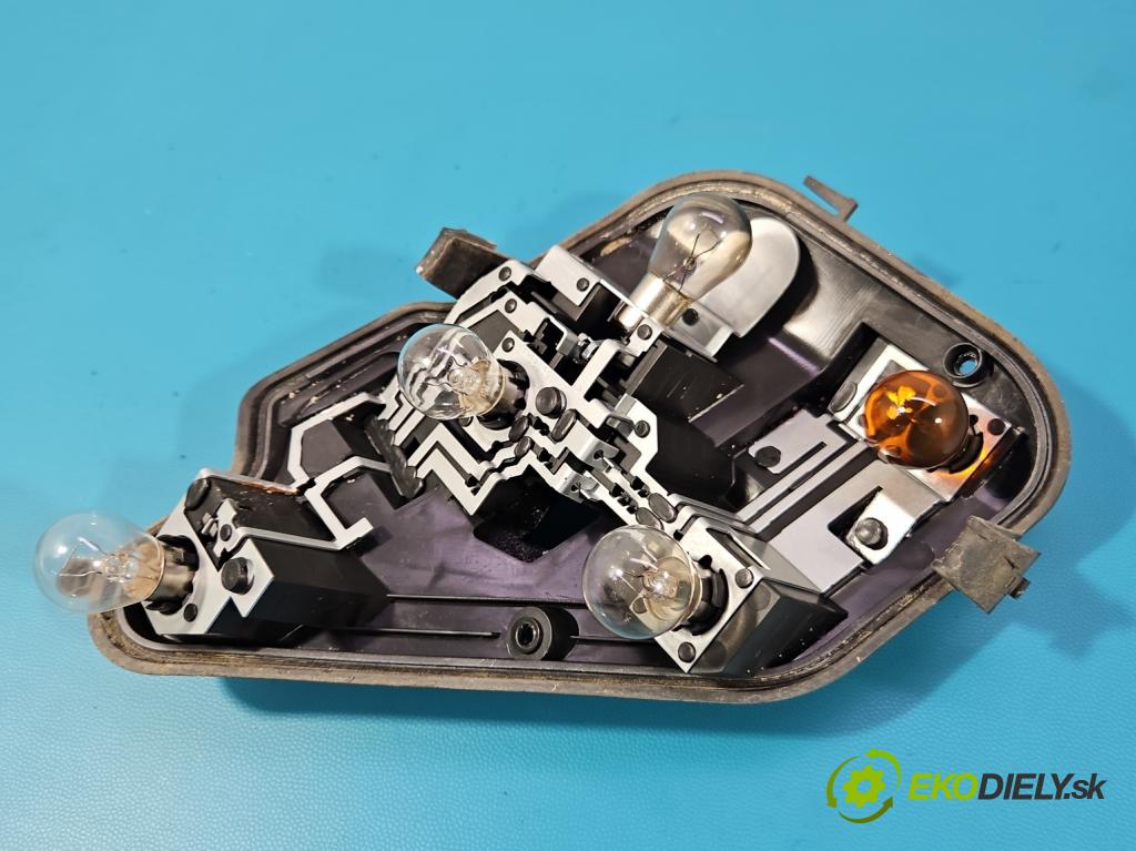 Opel Astra III 2004-2014 1.6 16V 105 HP manual 77 kW 1598 cm3 5- svetlo / reflektor zadné ľavé blatník