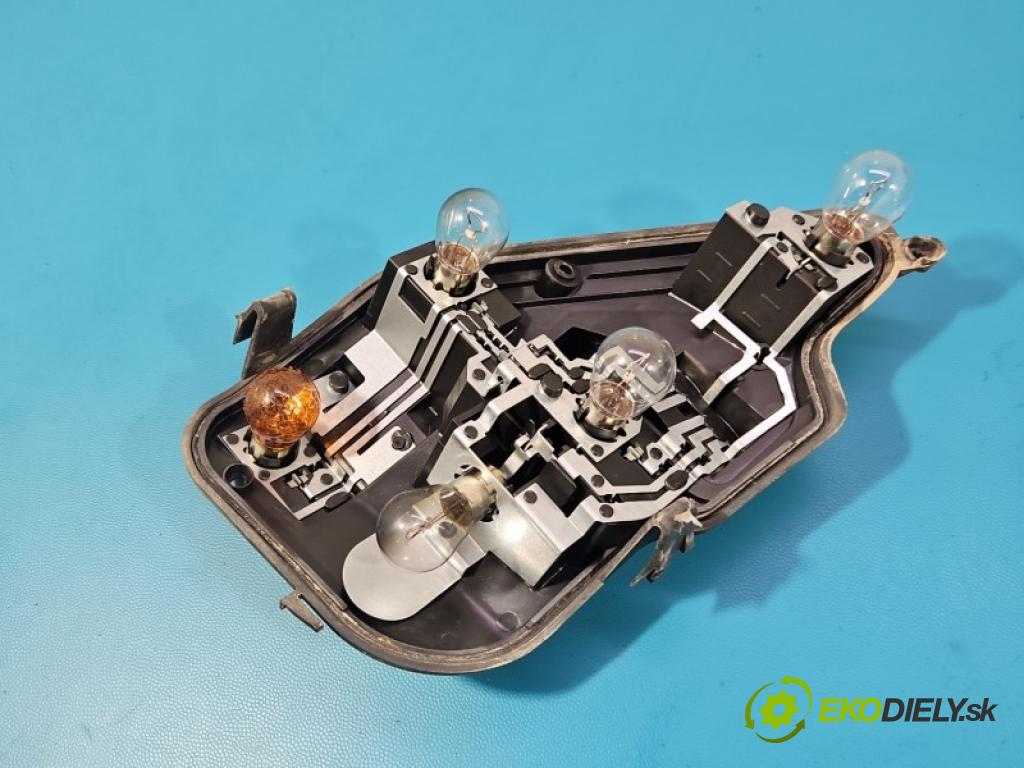 Opel Astra III 2004-2014 1.4 16V 90 hp manual 66 kW 1364 cm3 5- světlo zadní levé blatník: 24451835