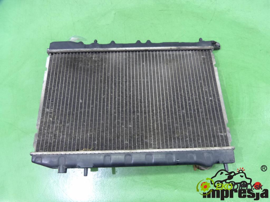 Nissan Almera N15 1995-2000 1.4 16V 75 HP  55 kW 1400 cm3  Chladič  (Chladiče)