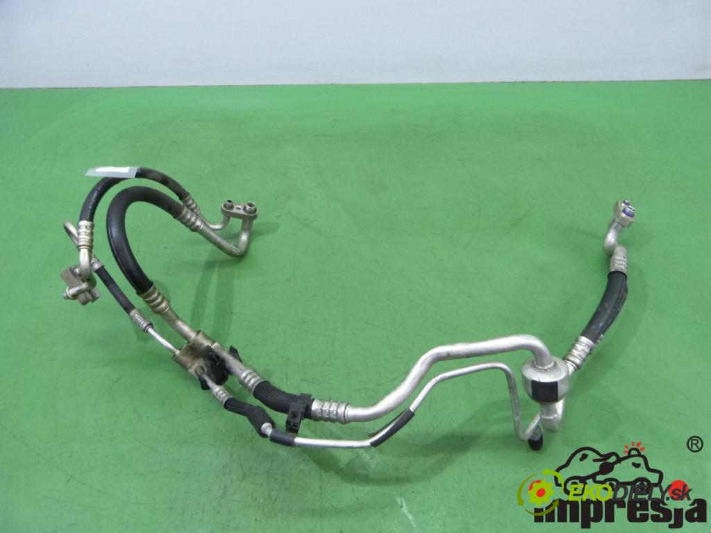 Opel Tigra B 2004-2009 1.4 16V 90 HP  66 kW 1400 cm3  Rúrka klimatizácie 