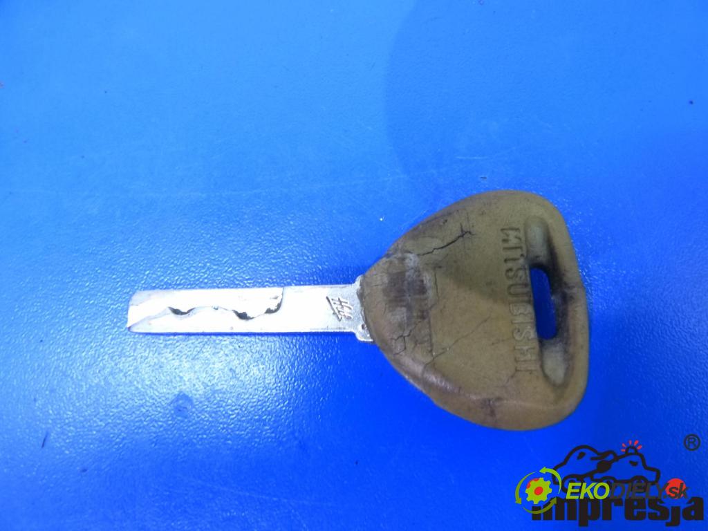 Mitsubishi Carisma 1.9 TD 90 HP  66 kW 1900 cm3  spinačka  (Spínacie skrinky a kľúče)