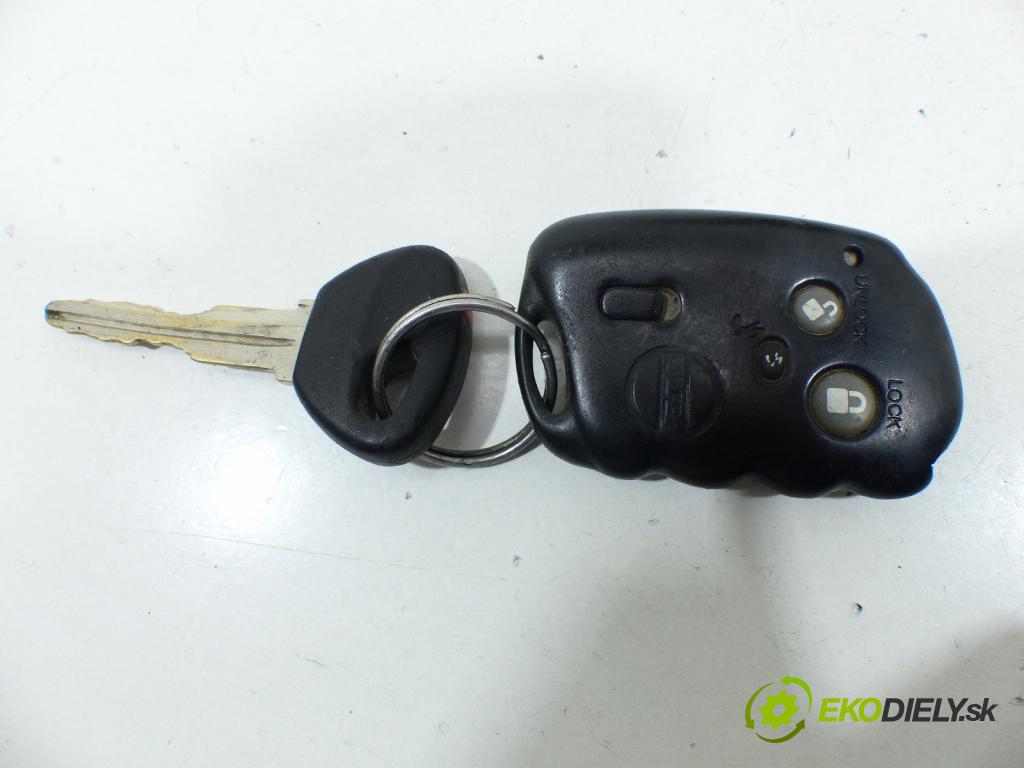 Mazda 323f 1.5 16V   1500 cm3  spinačka  (Spínacie skrinky a kľúče)
