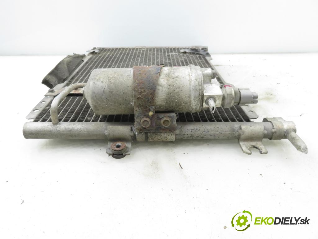 SUZUKI JIMNY (FJ) TERENOWY 2002 59,00 1.3 16V 4WD (SN413) - G13BB 1298,00 chladič klimatizace 9531181A00 (Chladič klimatizace)