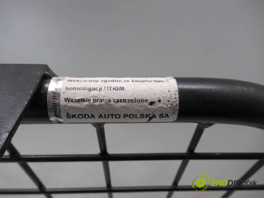 Skoda Octavia II LIFT    KOMBI 5D 2.0TDI 140KM 08-13  Mriežky deliaca  (Ostatné)