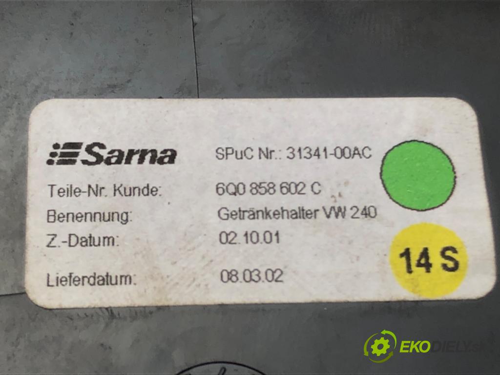 VW POLO (9N_, 9A_) 2001 - 2014    1.2 12V 47 kW [64 KM] benzyna 2001 - 2007  Držiak na nápoje 6Q0858602C (Úchyty, držiaky na nápoje)