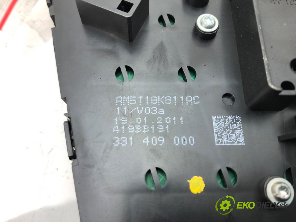 FORD FOCUS III 2010 - 2022    1.6 TDCi 85 kW [115 KM] olej napędowy 2010 - 2017  Panel ovládania radia AM5T18K811AC (Prepínače, spínače, tlačidlá a ovládače kúrenia)