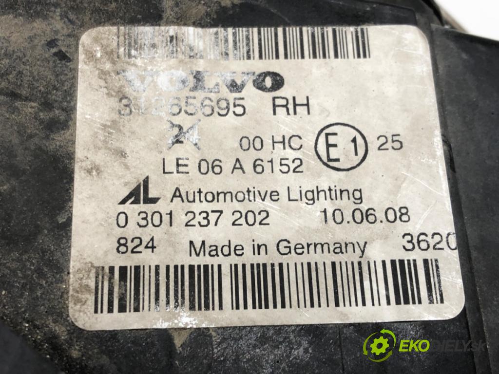 VOLVO V50 (545) 2003 - 2012    2.0 D 100 kW [136 KM] olej napędowy 2004 - 2010  světlomet pravý přední část LIFT 31265695