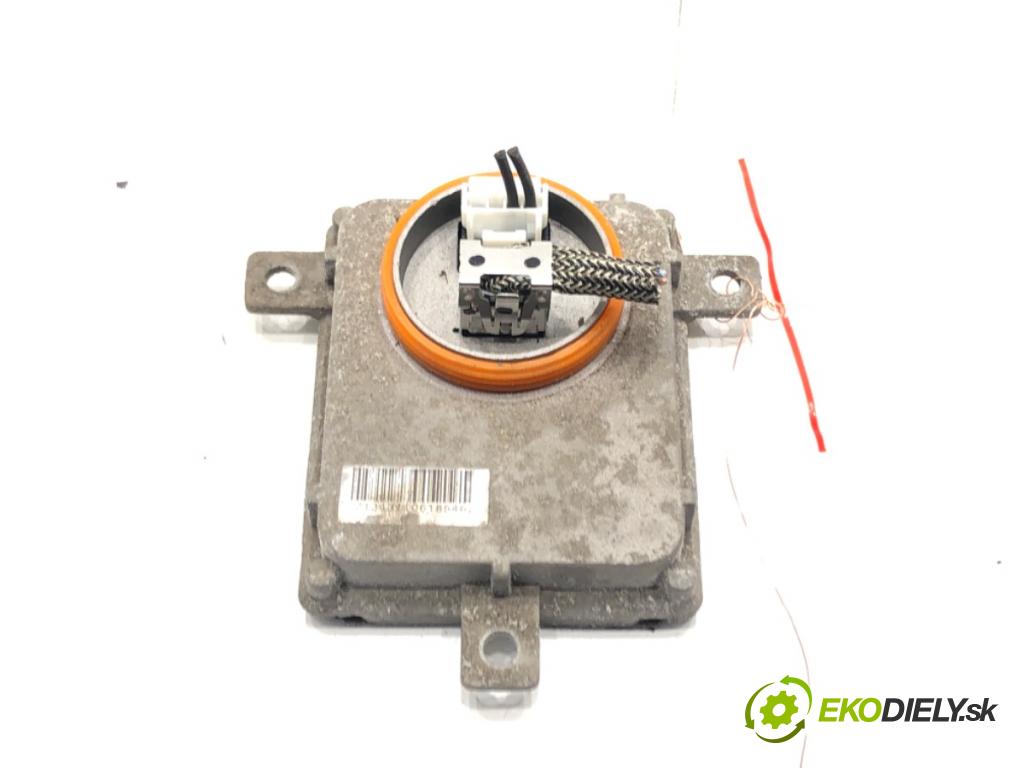 VW PASSAT B7 (362) 2010 - 2015    2.0 TDI 125 kW [170 KM] olej napędowy 2010 - 2014  Menič XENON 8K0941597B (Riadiace jednotky xenónu)