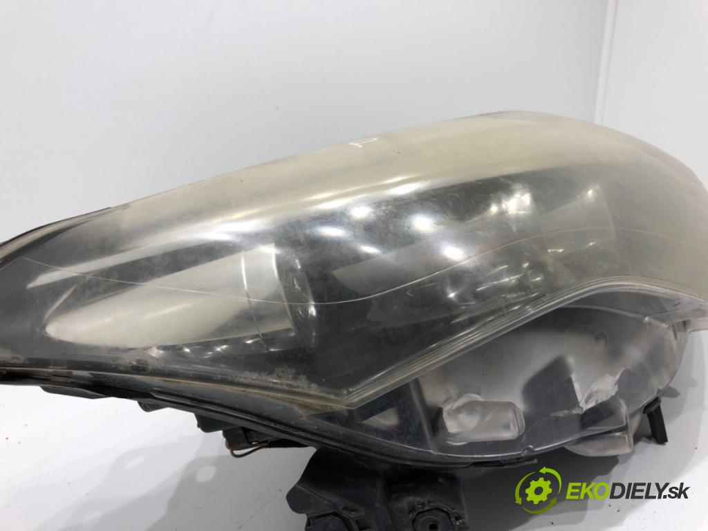 RENAULT LAGUNA III Grandtour (KT0/1) 2007 - 2015    2.0 dCi (KT07, KT0J, KT14, KT1A, KT1S) 96 kW [131 KM] olej napędowy 2007 - 2015  světlomet pravý přední část LIFT 260100247R