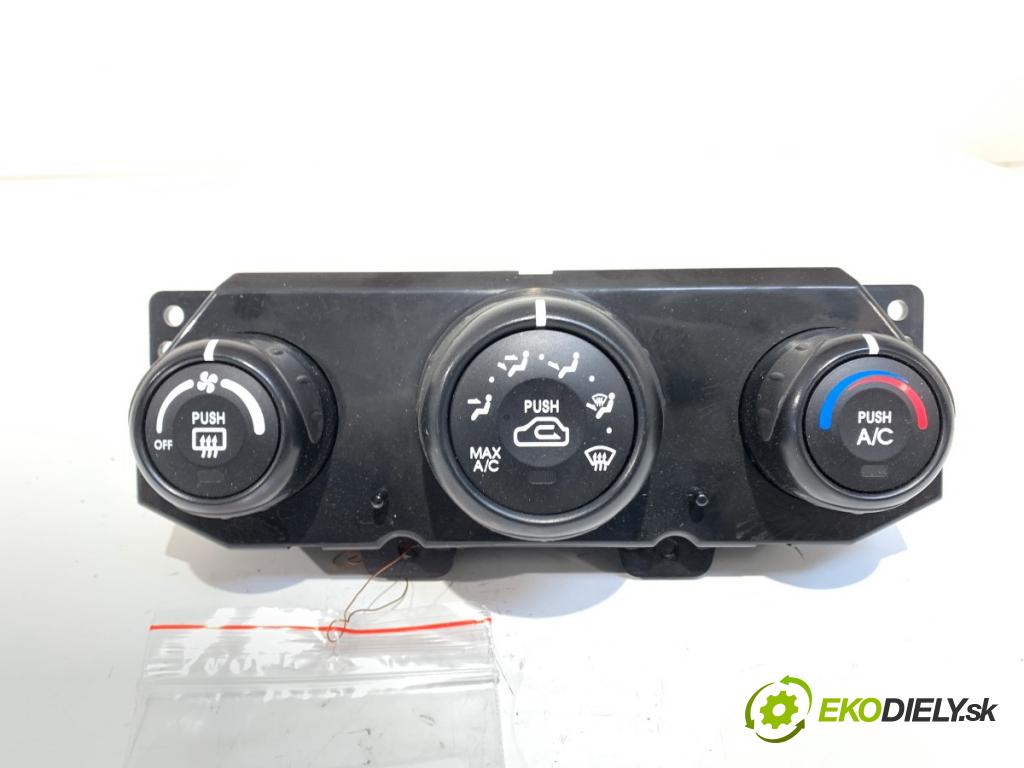KIA SPORTAGE II (JE_, KM) 2004 - 2022    2.0 i 16V 104 kW [141 KM] benzyna 2004 - 2022  Panel ovládania kúrenia  (Prepínacie páčky pod volantom)