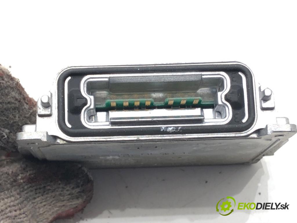 RENAULT LAGUNA III (BT0/1) 2007 - 2015    2.0 dCi (BT07, BT0J, BT14, BT1A, BT1S) 96 kW [131 KM] olej napędowy 2007 - 2015  Menič XENON 89034934 (Riadiaca jednotka xenónu)