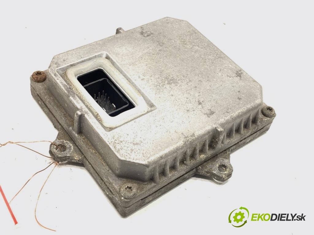 VW GOLF V (1K1) 2003 - 2010    2.0 TDI 103 kW [140 KM] olej napędowy 2004 - 2008  Menič XENON 1T0907391 1307329090 (Riadiaca jednotka xenónu)