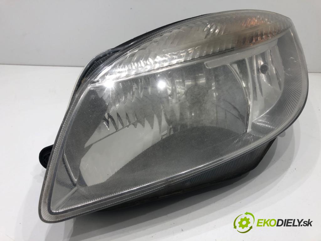 SKODA FABIA II Kombi 2009 59 kW 1.4 TDI 1422 světlomet levý přední část 