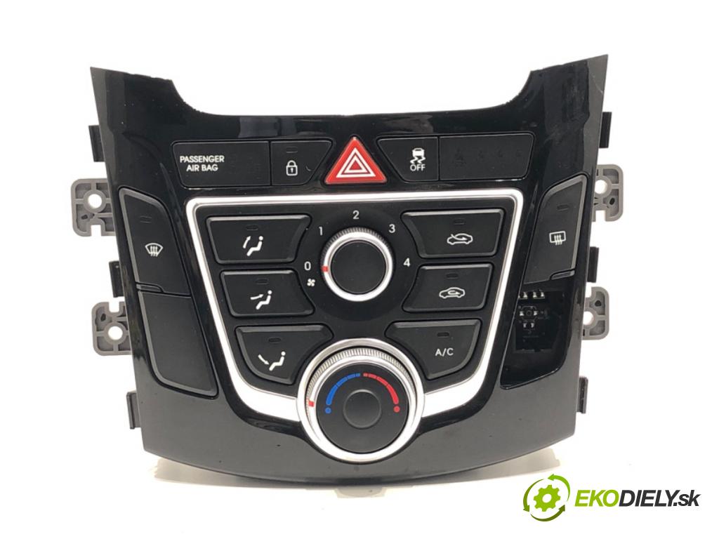 HYUNDAI i30 liftback 2015 66 kW 1.4 CRDi 1396 Panel ovládania kúrenia 97250-A6041GU (Prepínacie páčky pod volantom)