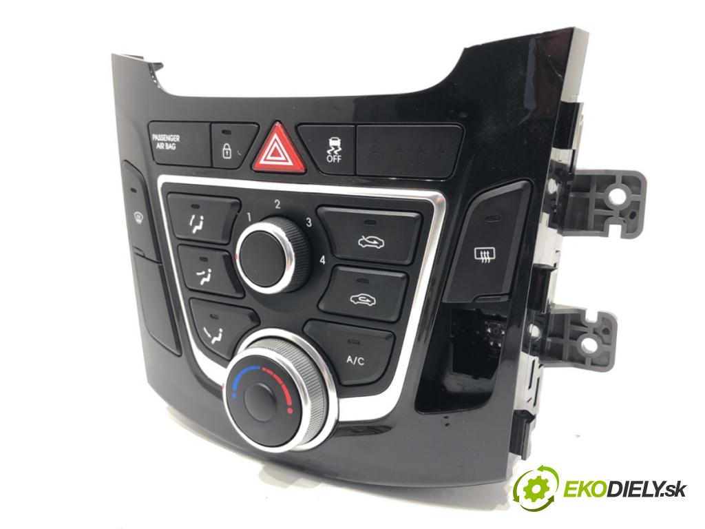 HYUNDAI i30 liftback 2015 66 kW 1.4 CRDi 1396 Panel ovládania kúrenia 97250-A6041GU (Prepínacie páčky pod volantom)